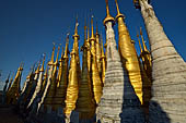 Inle Lake Myanmar. Indein, on the summit of a hill the  Shwe Inn Thein Paya a cluster of hundreds of ancient stupas. Many of them are ruined and overgrown with bushes. 